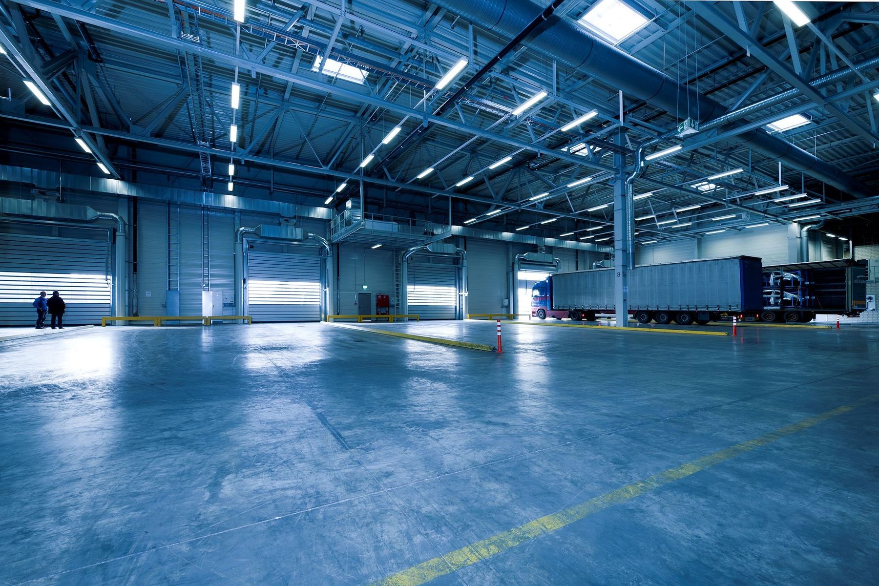 Illustrative photograph of a warehouse dock interior. Not a 419 project.